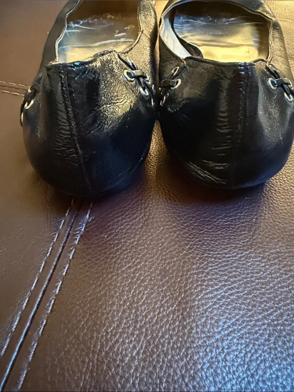 Micheal Kors black flats with grommet /leather detail sz 9.5